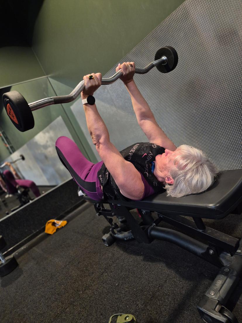 Coach et client dans la salle de sport